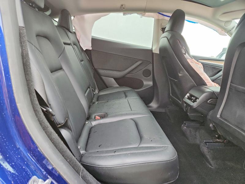 Photo 11 from auction – 2023 TESLA MODEL Y with VIN 7SAYGDEE4PF841764