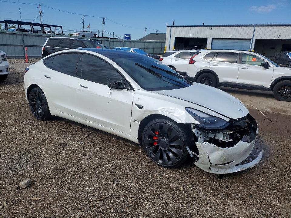 Photo 4 from auction – 2023 TESLA MODEL 3 with VIN 5YJ3E1ECXPF668889