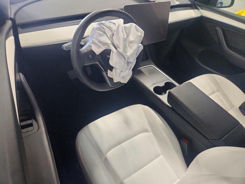 Photo 8 from auction – 2023 TESLA MODEL Y with VIN 7SAYGDEE2PF610247
