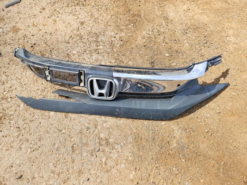 Photo 12 from auction – 2018 HONDA CIVIC with VIN 2HGFC2F52JH557166