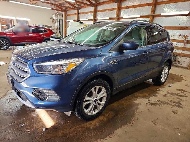FORD ESCAPE 2018 with VIN 1FMCU0GD9JUC46898 - Photo from auction