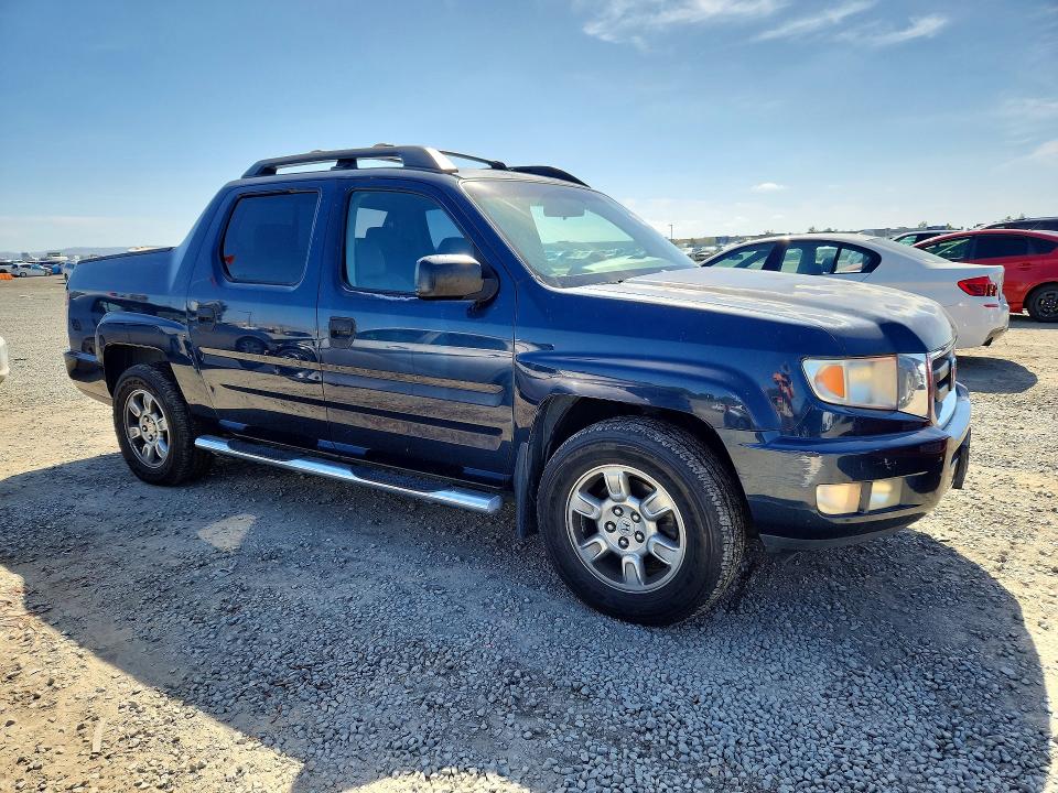 Photo 4 from auction – 2009 HONDA RIDGELINE with VIN 5FPYK16209B102142