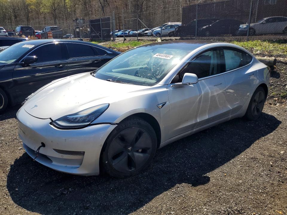 TESLA MODEL 3 2018 with VIN 5YJ3E1EA5JF040423 - Photo from auction