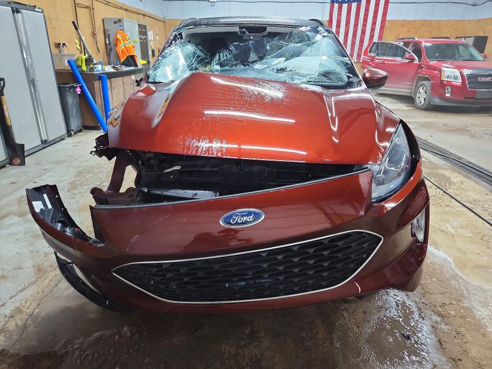 Photo 5 from auction – 2021 FORD ESCAPE with VIN 1FMCU9H65MUA70635
