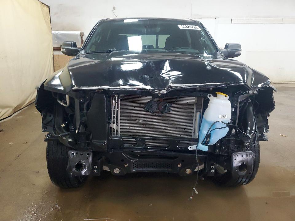 Photo 5 from auction – 2023 RAM 1500 with VIN 1C6SRFMT5PN567461