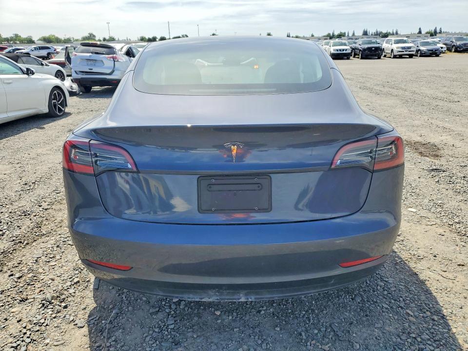 Photo 6 from auction – 2023 TESLA MODEL 3 with VIN 5YJ3E1EA9PF590524
