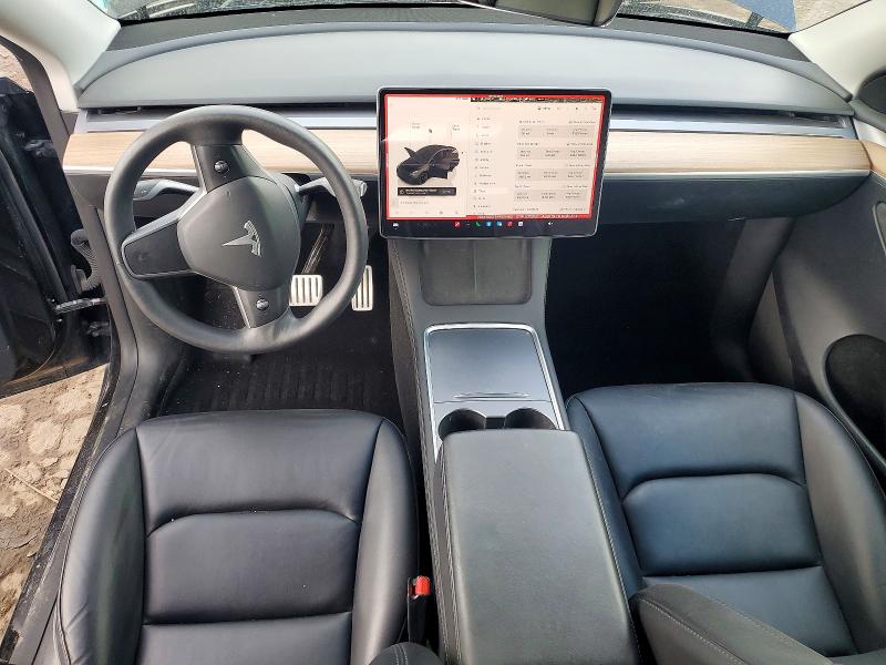Photo 8 from auction – 2023 TESLA MODEL Y with VIN 7SAYGDEF8PF811465