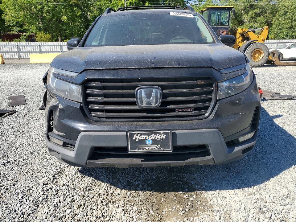Photo 5 from auction – 2021 HONDA RIDGELINE with VIN 5FPYK3F11MB002885