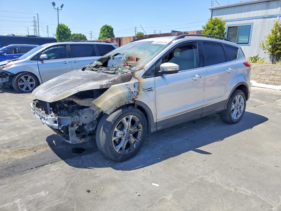 FORD ESCAPE 2014 with VIN 1FMCU0JX8EUB99565 - Photo from auction