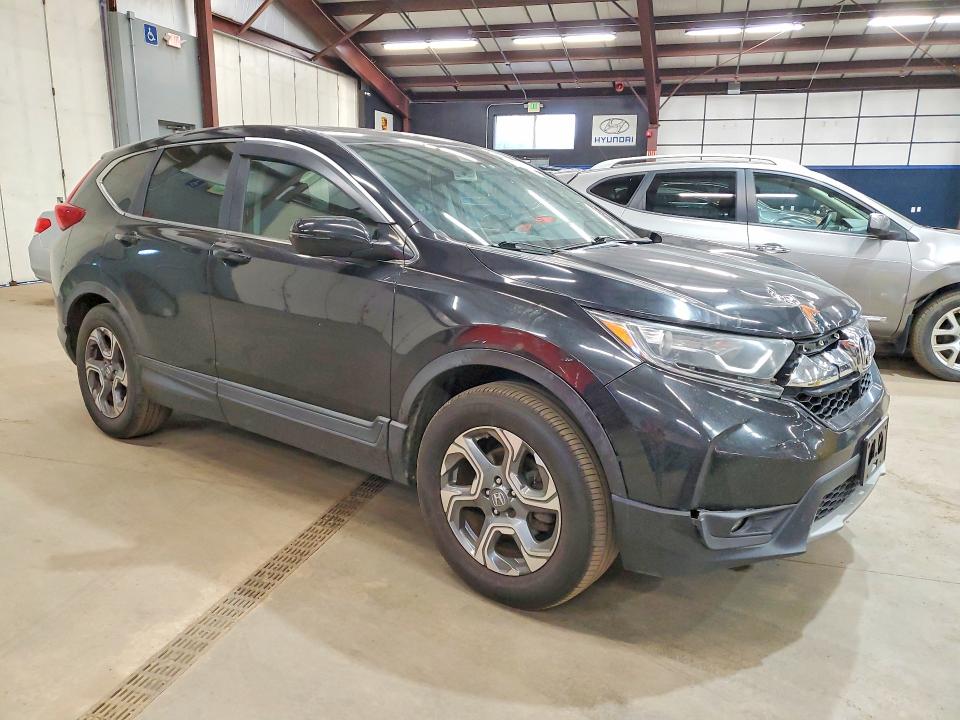 Photo 4 from auction – 2018 HONDA CR-V with VIN 7FARW2H59JE096722
