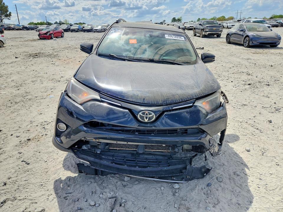 Photo 5 from auction – 2018 TOYOTA RAV4 with VIN 2T3WFREV7JW421311
