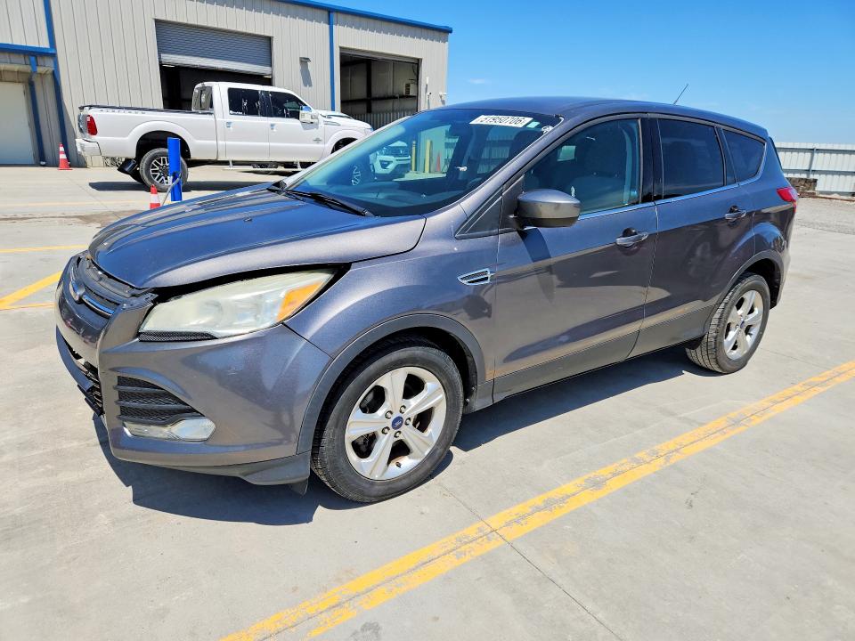 FORD ESCAPE 2014 with VIN 1FMCU0GX1EUA51670 - Photo from auction