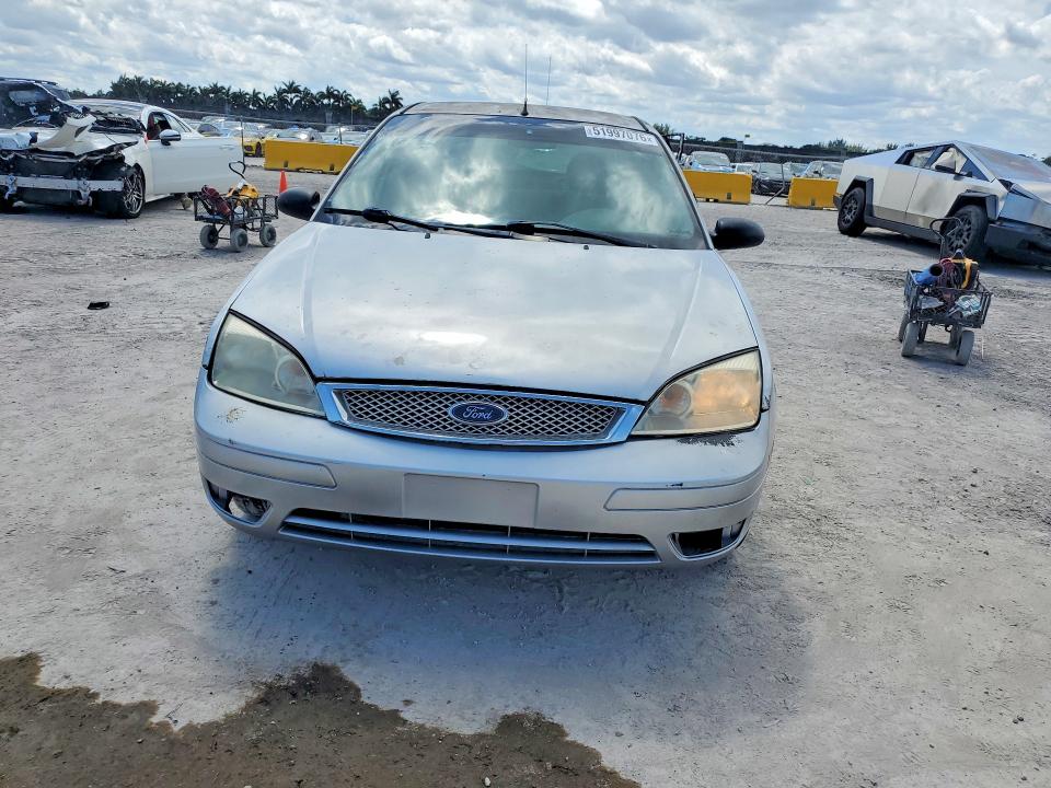 Photo 5 from auction – 2007 FORD FOCUS with VIN 1FAHP34N57W341817