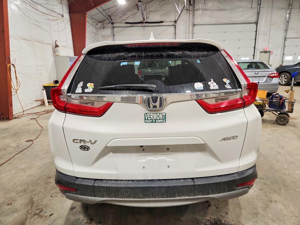 Photo 6 from auction – 2019 HONDA CR-V with VIN 2HKRW2H86KH658665