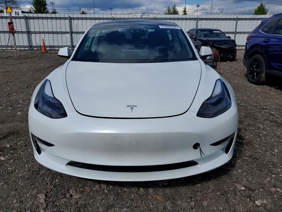 Photo 5 from auction – 2022 TESLA MODEL 3 with VIN 5YJ3E1EB5NF276262
