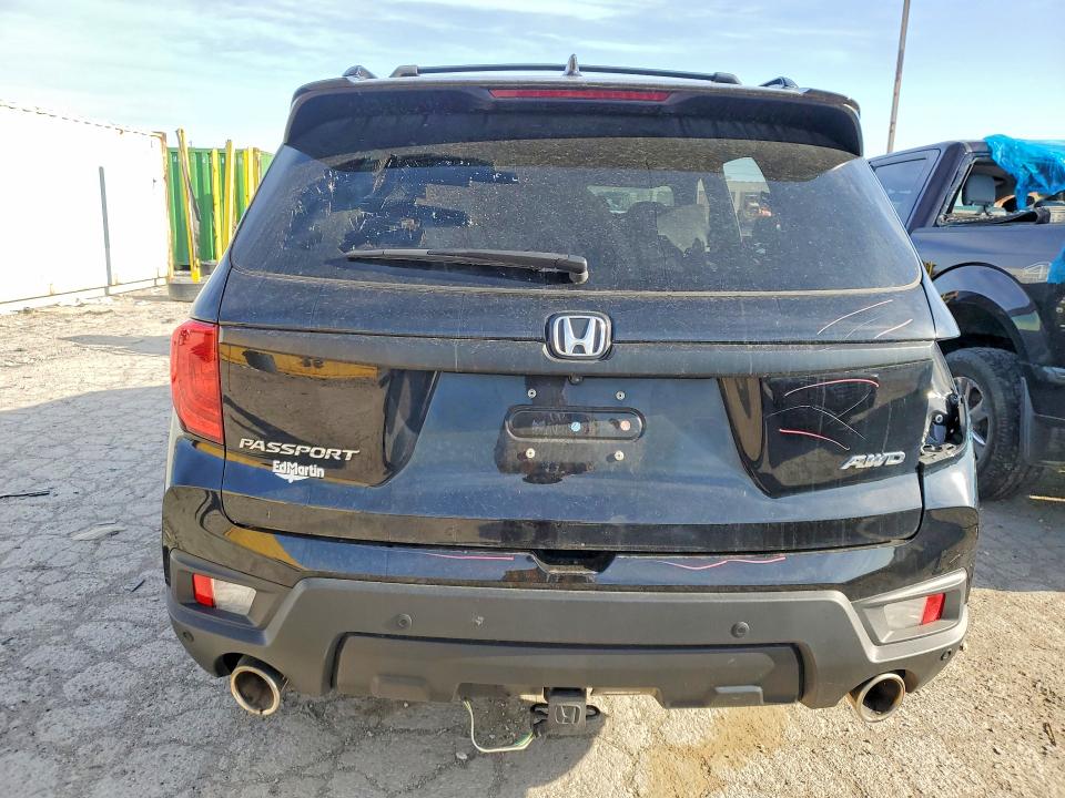 Photo 6 from auction – 2023 HONDA PASSPORT with VIN 5FNYF8H52PB013909