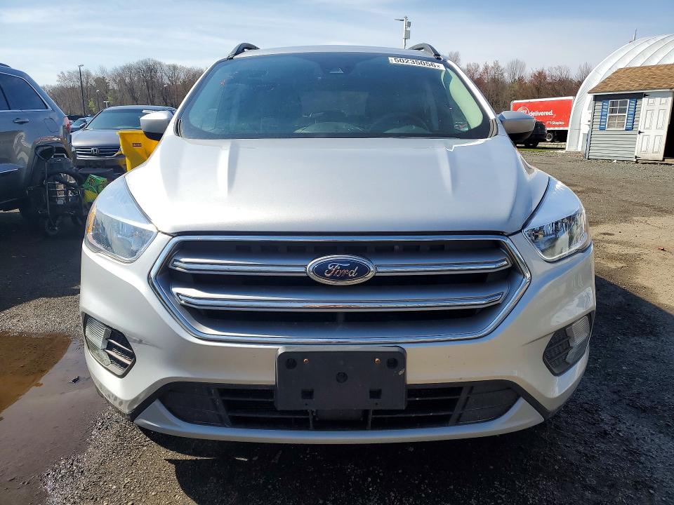 Photo 5 from auction – 2018 FORD ESCAPE with VIN 1FMCU9GD8JUC88788
