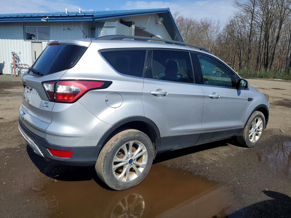 Photo 3 from auction – 2018 FORD ESCAPE with VIN 1FMCU9GD8JUC88788