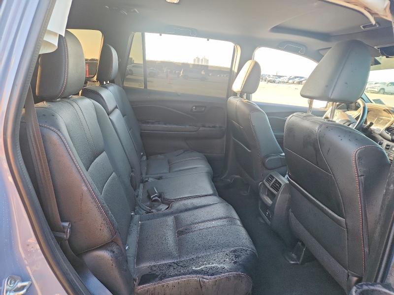 Photo 11 from auction – 2022 HONDA PASSPORT with VIN 5FNYF8H62NB025967