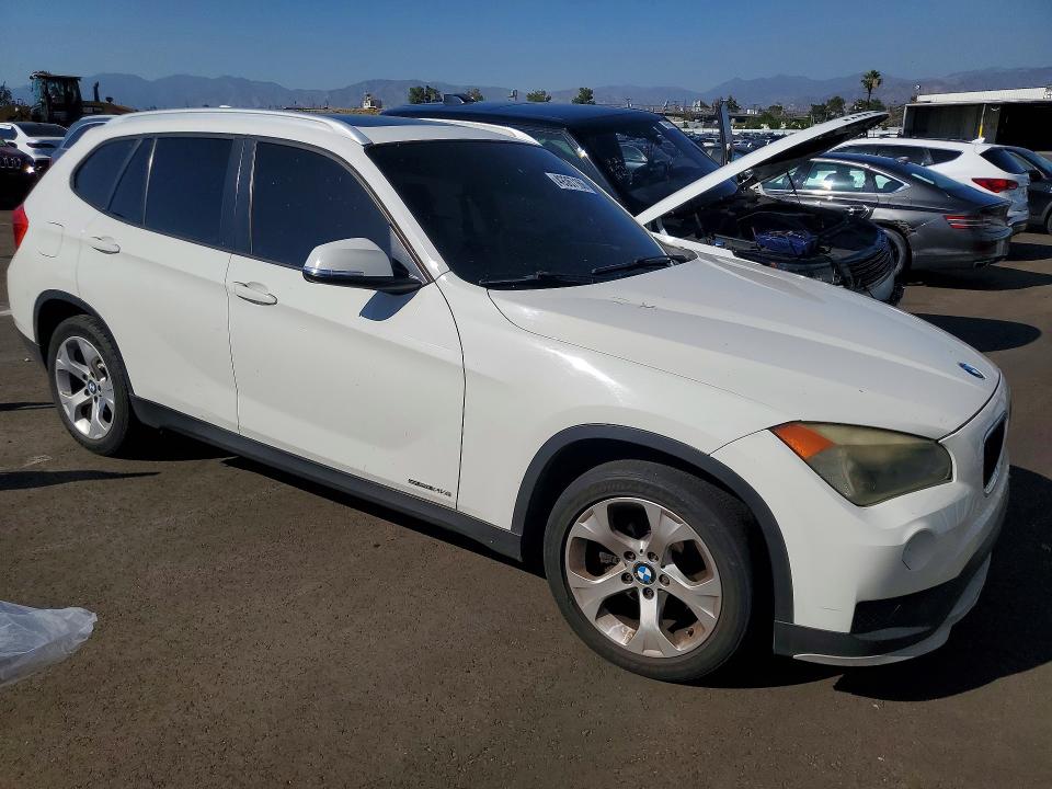 Photo 4 from auction – 2015 BMW X1 with VIN WBAVM1C54FVW56833