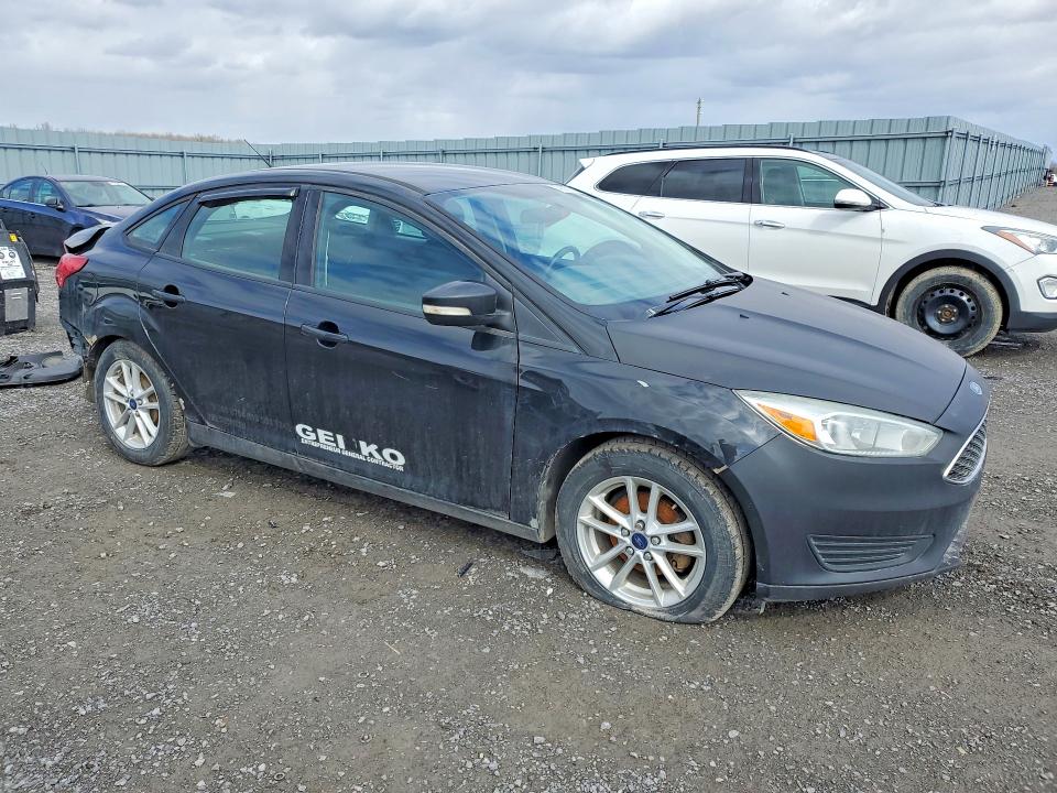 Photo 4 from auction – 2015 FORD FOCUS with VIN 1FADP3F29FL296883