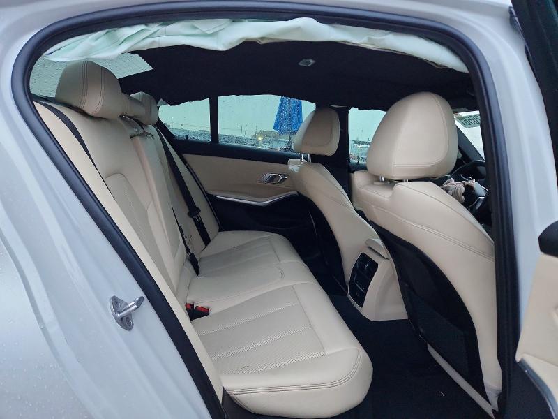 Photo 10 from auction – 2023 BMW 330I with VIN 3MW69FF0XP8D19767