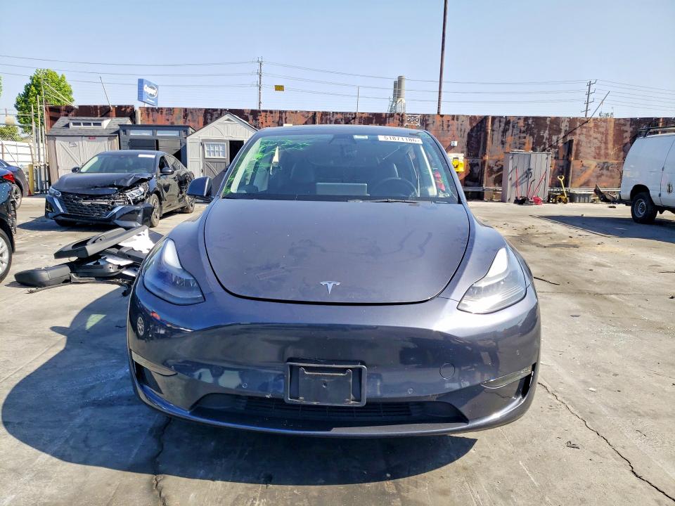 Photo 5 from auction – 2022 TESLA MODEL Y with VIN 7SAYGDEF0NF486677