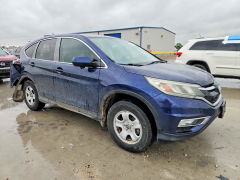 Photo 4 from auction – 2015 HONDA CR-V with VIN 2HKRM3H58FH508340