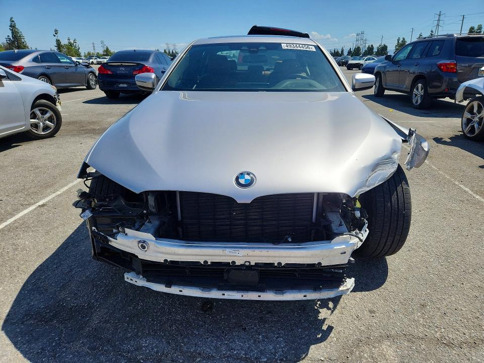 Photo 5 from auction – 2019 BMW 530E with VIN WBAJA9C55KB398663