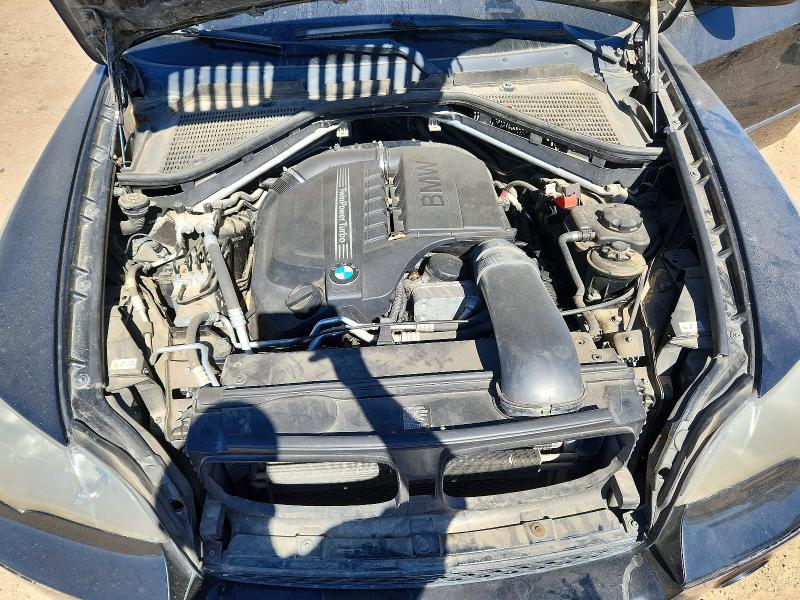 Photo 12 from auction – 2012 BMW X5 with VIN 5UXZV4C52CL987533