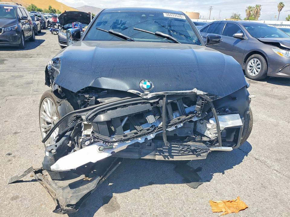 Photo 5 from auction – 2024 BMW 330I with VIN 3MW69FF00R8E02384