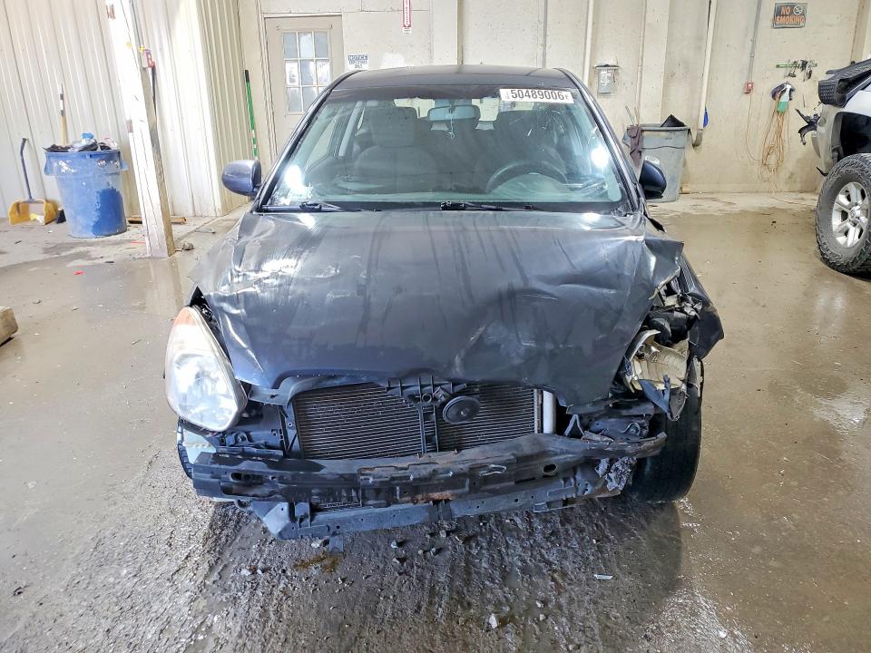 Photo 5 from auction – 2010 HYUNDAI ACCENT with VIN KMHCM3AC2AU181054