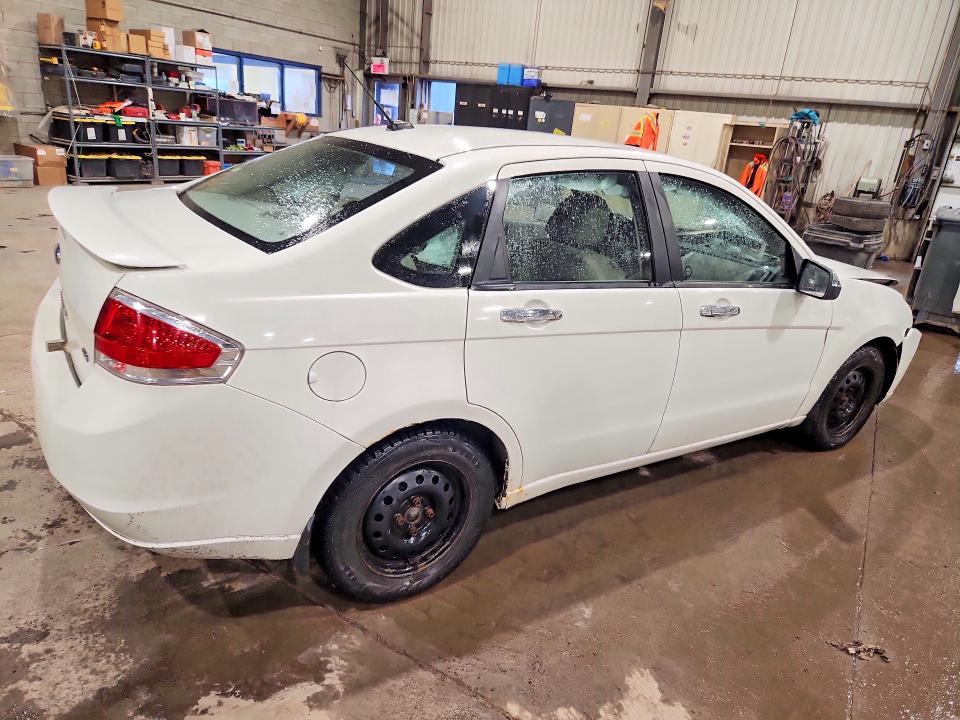 Photo 3 from auction – 2010 FORD FOCUS with VIN 1FAHP3FNXAW259733
