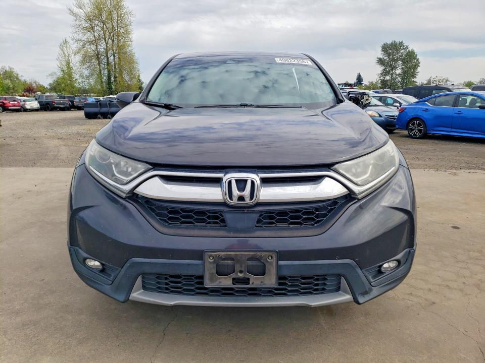 Photo 5 from auction – 2017 HONDA CR-V with VIN 2HKRW1H80HH513608