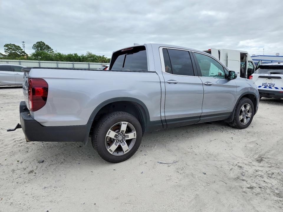 Photo 3 from auction – 2024 HONDA RIDGELINE with VIN 5FPYK3F59RB004748