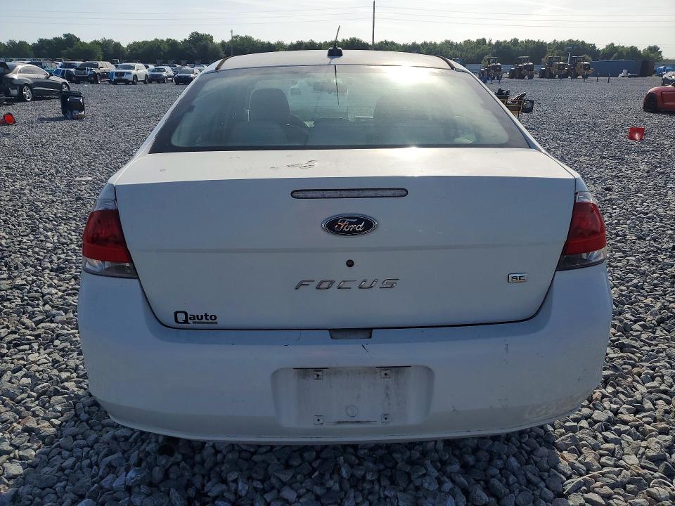 Снимка 6 от търг – 2009 FORD FOCUS с VIN 1FAHP35N19W110012