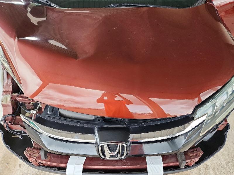 Photo 11 from auction – 2015 HONDA CR-V with VIN 2HKRM3H36FH510490