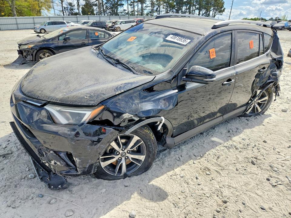TOYOTA RAV4 2018 with VIN 2T3WFREV7JW421311 - Photo from auction