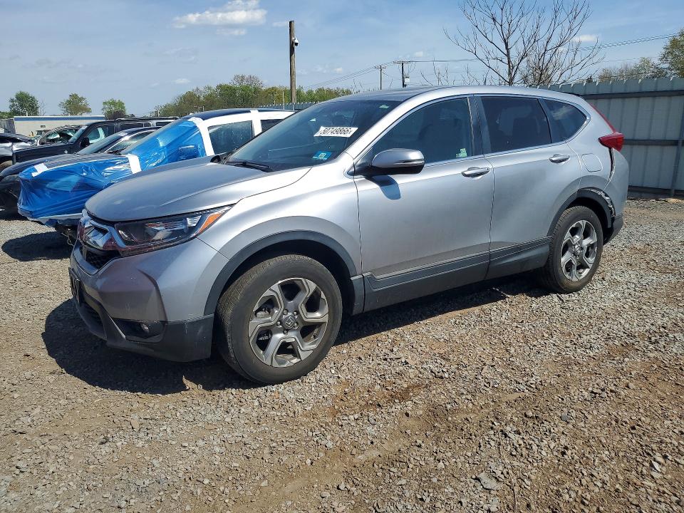 Photo 1 from auction – 2018 HONDA CR-V with VIN 2HKRW2H89JH690346