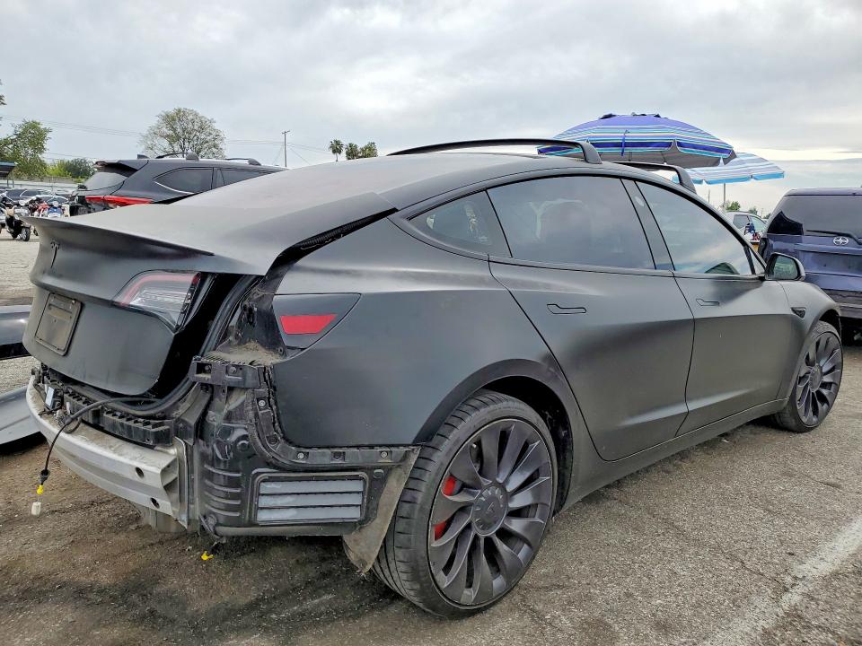 Photo 3 from auction – 2021 TESLA MODEL 3 with VIN 5YJ3E1EC9MF860672