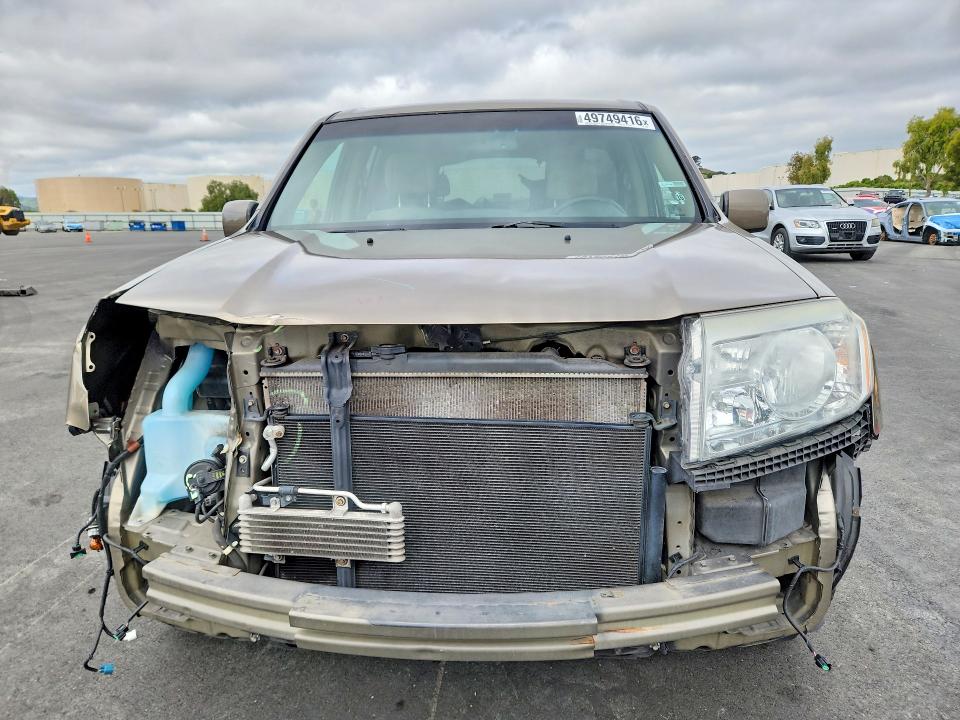 Photo 5 from auction – 2011 HONDA PILOT with VIN 5FNYF4H49BB105592