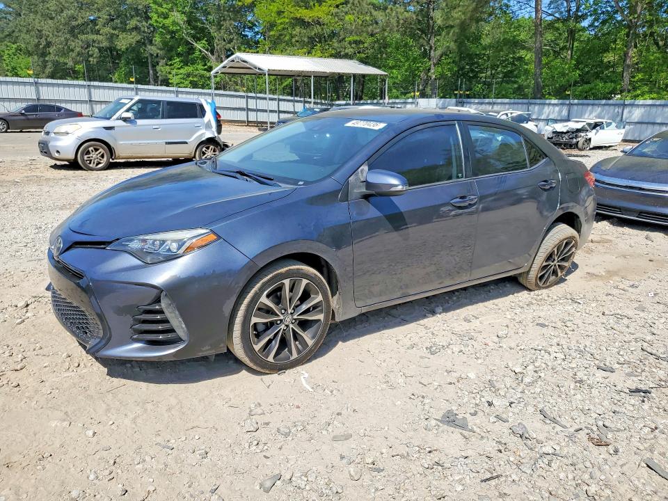 Снимка 1 от търг – 2017 TOYOTA COROLLA с VIN 5YFBURHE2HP635031