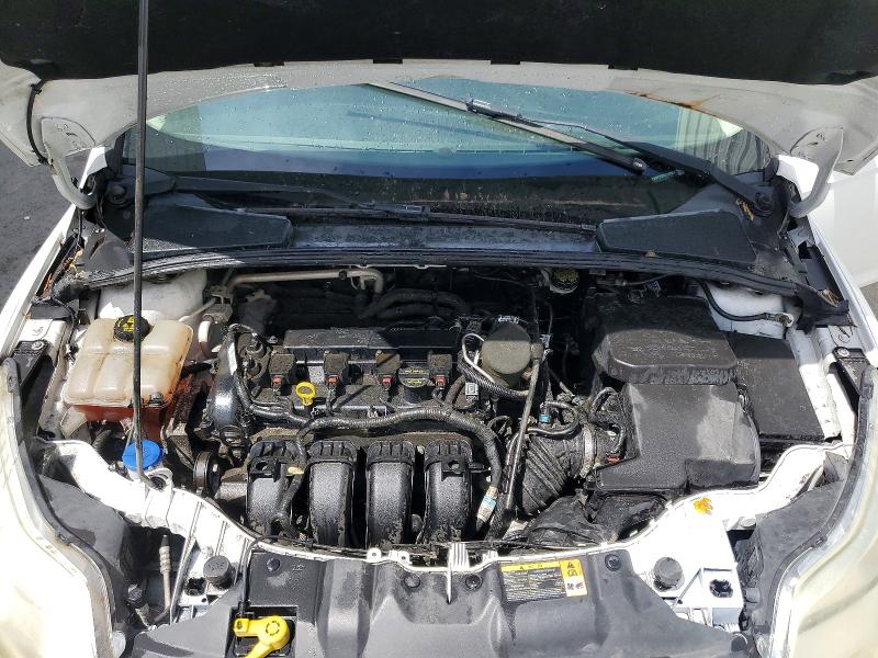 Photo 11 from auction – 2014 FORD FOCUS with VIN 1FADP3F2XEL167811