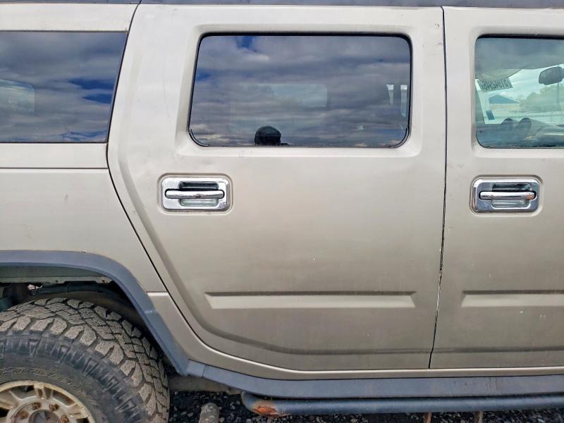 Photo 11 from auction – 2004 HUMMER H2 with VIN 5GRGN23U64H118618