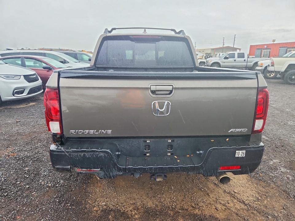 Photo 6 from auction – 2022 HONDA RIDGELINE with VIN 5FPYK3F53NB031082