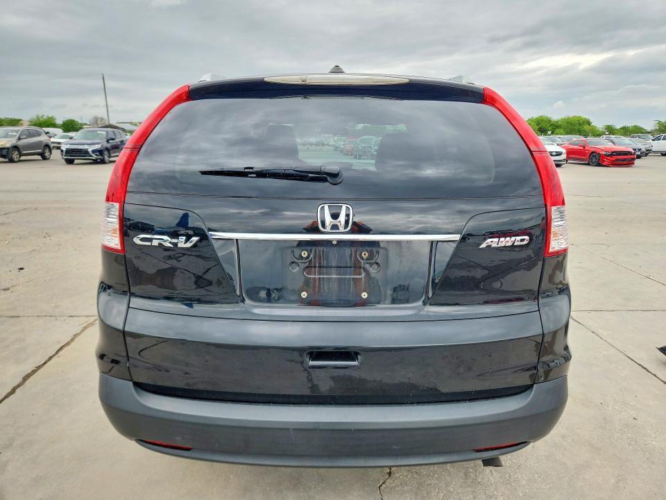 Photo 6 from auction – 2014 HONDA CR-V with VIN 2HKRM4H76EH602044