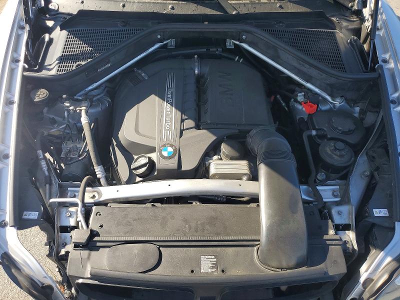 Photo 11 from auction – 2013 BMW X5 with VIN 5UXZV4C55D0G51087