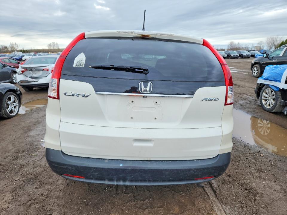 Photo 6 from auction – 2014 HONDA CR-V with VIN 2HKRM4H33EH133802