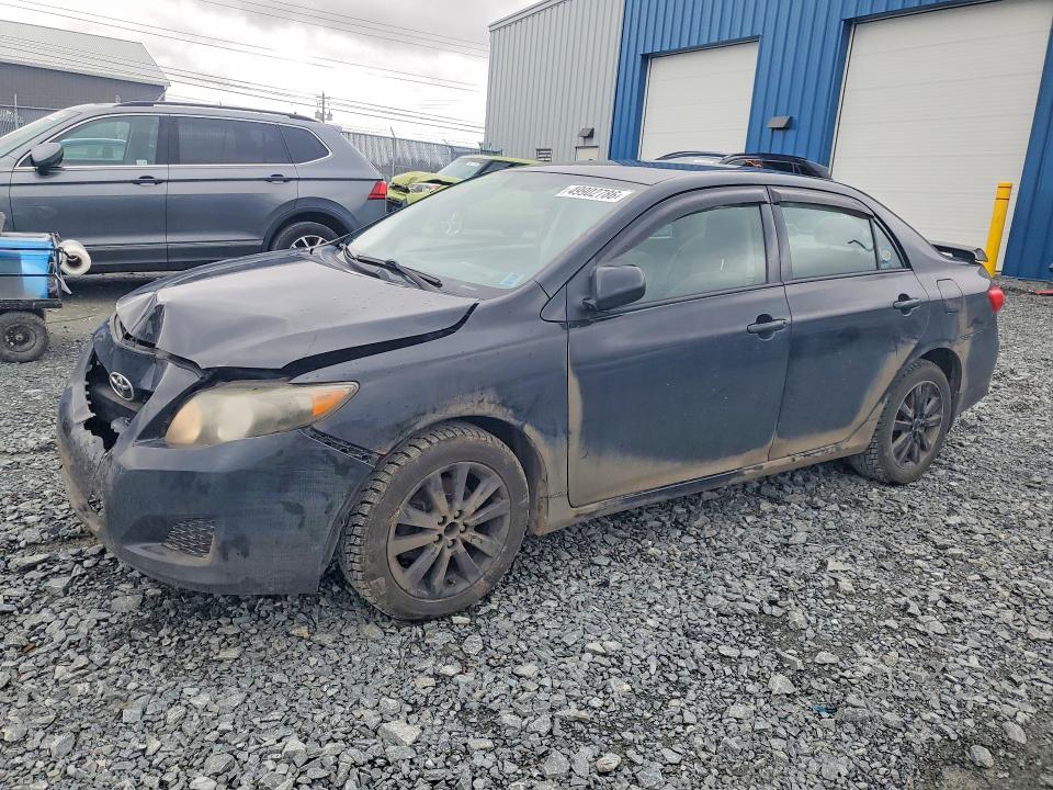 TOYOTA COROLLA 2011 with VIN 2T1BU4EE0BC618016 - Photo from auction