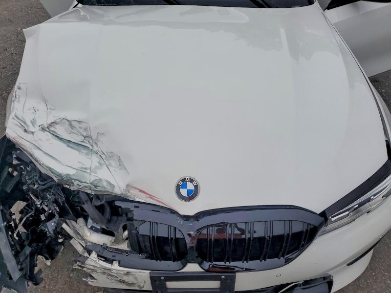 Photo 11 from auction – 2022 BMW 330XI with VIN 3MW5R7J03N8C25185